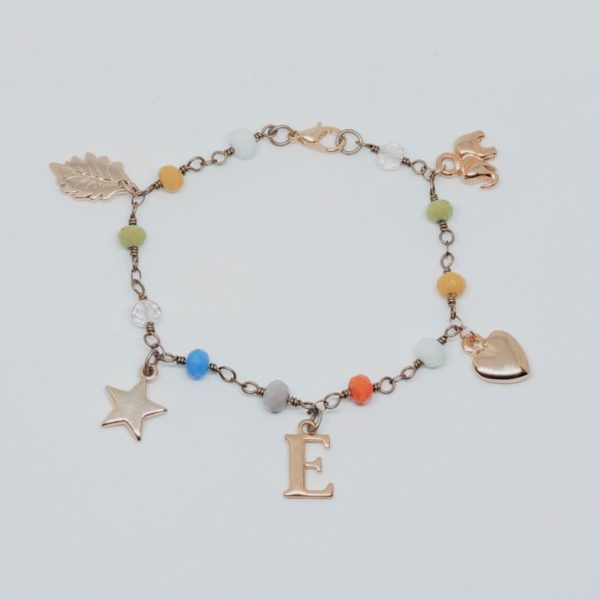 pulsera multicolor letra dorada lisa